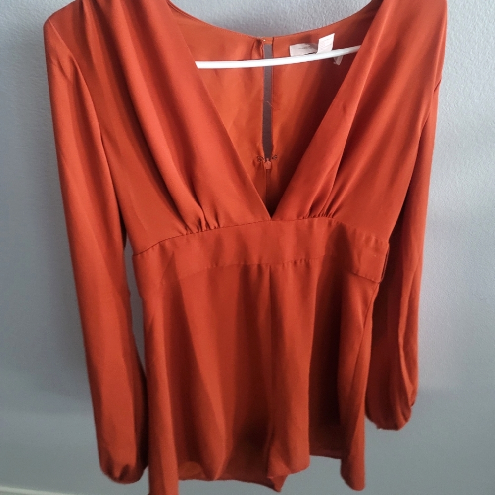 Long sleeve rust color (orange/red) romper